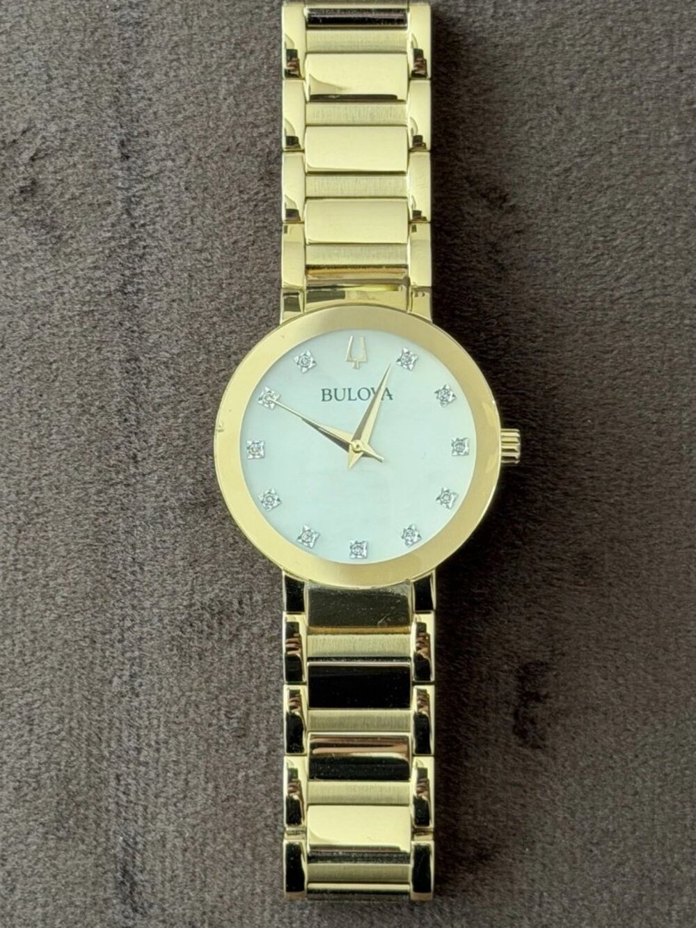 Bulova Women's Quartz Gold Tone Stainless Bracelet White Dial Diamond Markers
